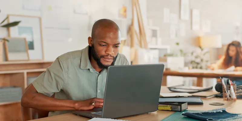 A man searching the laptop